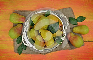 Ripe pears on a plate. top view. Village organic products.