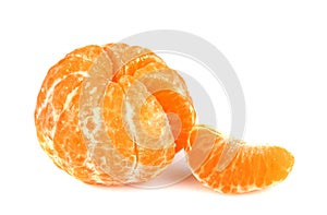Ripe peeled orange with a slice