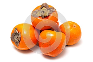 Ripe persimmon isolated on a white background