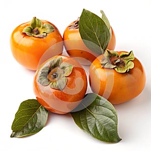Ripe persimmons with leaves isolated on white background photo