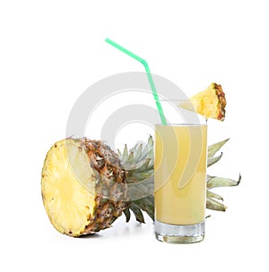 Ripe pineapple slice and juice in a glass