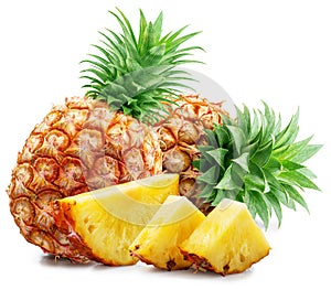 Ripe pineapple and pineapple slices isolated on white background. File contains clipping path photo