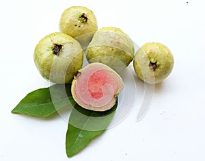 ripe pink guava ,red guava (psidium guajava) fruit with green leaf and half slices,whole isolated on white backdrop