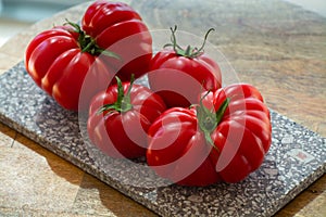Ripe pink tasty monterosa tomatoes from Spain