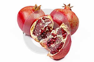Ripe pomegranate fruit isolated on white background cutout