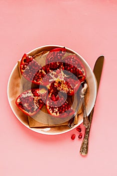 Ripe pomegranate in plate