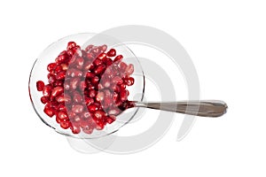 Ripe pomegranate seeds isolated on white