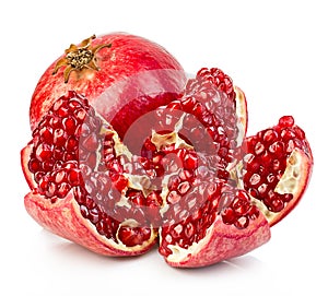 Ripe pomegranates close-up on a white background.