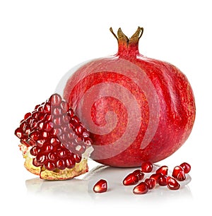 Ripe pomegranates isolated on a white