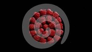 Ripe Raspberries On A Black Background