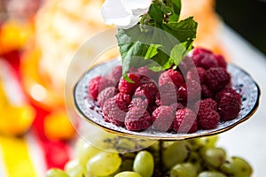 Ripe raspberries on a plate