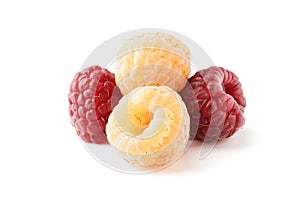 Ripe raspberries of two types, yellow and red, isolated on a white