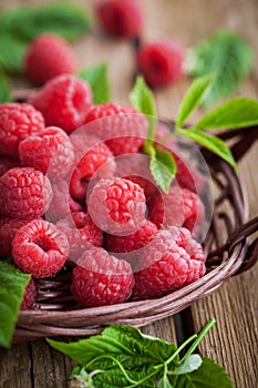 Ripe raspberry with leaf