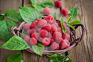 Ripe raspberry with leaf