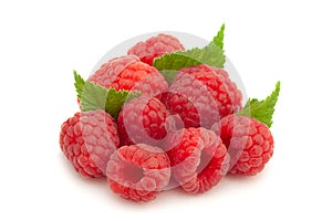 Ripe raspberry with leaf on white