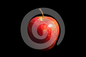 Ripe red apple on a black background