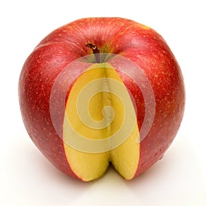 Ripe red apple closeup cut a slice photo