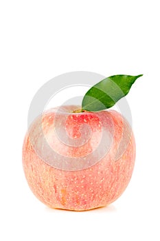 A Ripe Red Apple With Leaf