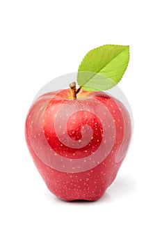 Ripe red apple with leaf isolated.