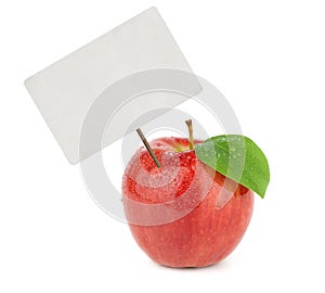 Ripe red apple with price tag