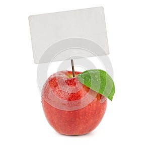 Ripe red apple with price tag