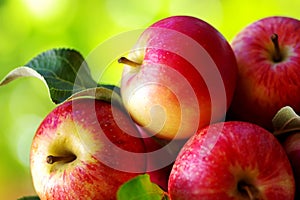 Ripe red apples on table