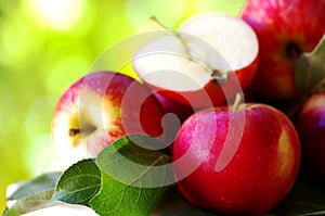 Ripe red apples on table