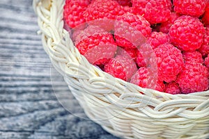 Ripe red berry. Raspberry close-up on the table.