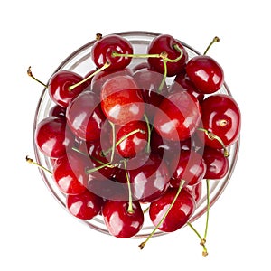 Ripe red cherries. Bowl full of sweet cherries on isolated white background. File contains clipping path