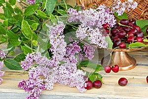 Ripe red cherries in a vase