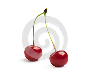 Ripe red cherry isolated on white background