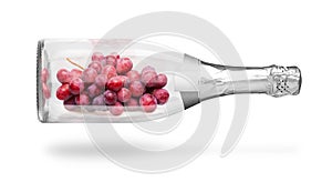 Ripe red grape in a bottle