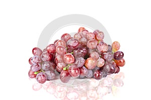 Ripe red grapes large bunch of fruits on white background