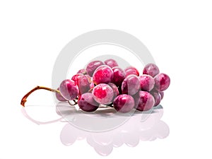 ripe red grapes - white background