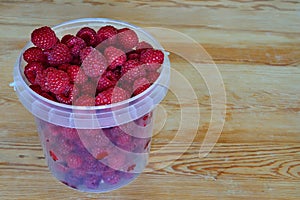 Ripe red raspberry berries close up. Natural vitamin food