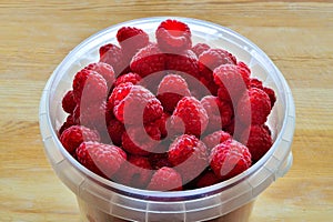Ripe red raspberry berries close up. Natural vitamin food