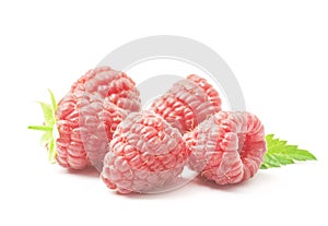 Ripe red raspberry with green leaf isolated on white background