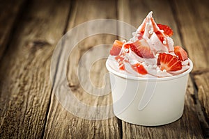 Ripe red strawberries and frozen yogurt