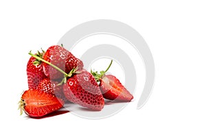 Ripe red strawberries on a white background