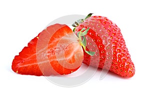 Ripe red strawberry. Whole and half