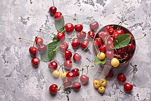 Ripe red and yellow cherries photo