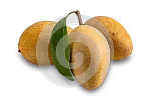 Ripe sapodilla fruits with green leaf isolated on white background