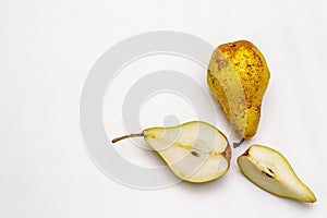 Ripe single pear. Fresh whole fruit, half sliced, seeds. Isolated on white background