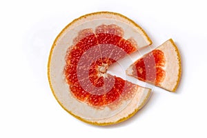 Ripe slice of red grapefruit on a white background close-up. Citrus isolated object. Cut a slice of sour fruit