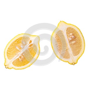 Ripe slice of yellow lemon citrus fruit isolated over white background