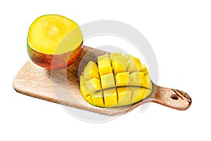 Ripe sliced mango fruit on a chopping Board. Isolated on white background. Top view.