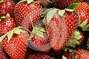 Ripe strawberries. Close macro view of fruit pattern.