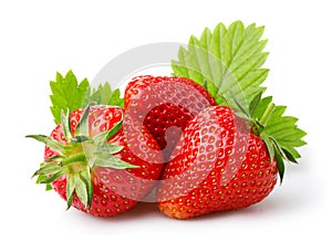 Ripe strawberries with leaves isolated on a white photo