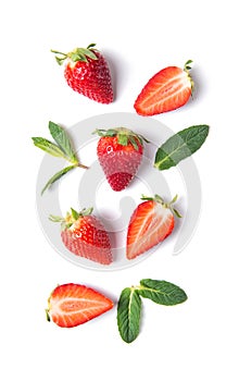 Ripe strawberries and mint leaves isolated on white background, top view