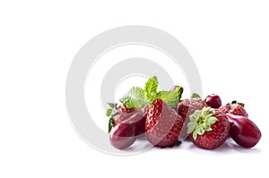 Ripe strawberries and red berries isolated on white background. Background of mix fruits with copy space for text.